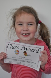 Day 15: Lola being so happy to have received her first certificate from school #proud