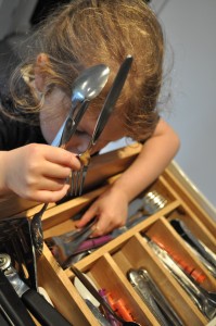 Day 33:  Lola being helpful by setting the table for dinner