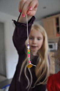 Day 48:  Making bracelets with the girls on a rainy afternoon