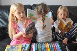 Day 117:  The girls reading their new books - given to them as a reward for earning such super school reports. #proud