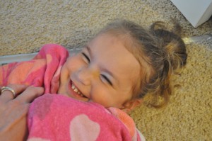 Day 211:  My youngest is so ticklish that just getting her dry after a bath ends up in a full on giggle-fest :)