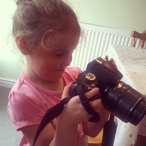 Day 200:  My littlest monkey following in her Mummy's footsteps - trying out my camera for size!