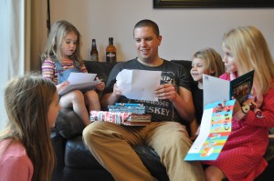 Day 290:  My husband's birthday - here he is surrounded by all his girls and being spoiled with presents