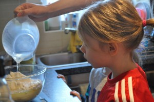 Day 333:  My girls baking bread with their Daddy