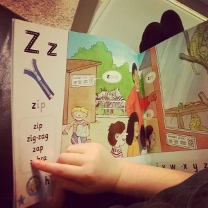 Day 321:  Snuggling up on the sofa with my girls before bedtime to practice their reading