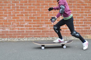 Day 446:  Mimi got a skateboard for her birthday - she got the hang of it pretty quickly (though still needs a bit more practice)