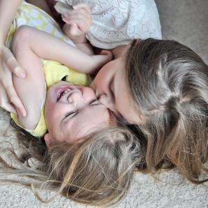 Day 452:  Sophie is fantastic with her sisters.  Tickle fights are one of her specialities :)