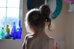 Day 457:  Capturing this shot of my littlest daughter, lost in thought as she washed her hands.