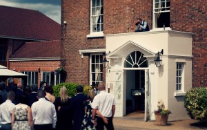 Day 500:  Occasionally I get offered the opportunity to be the second shooter at a wedding, alongside the photographer who captured my wedding over a year ago.  This is one of my shots from today of him being a daredevil - there's nothing he won't do to get a great image!