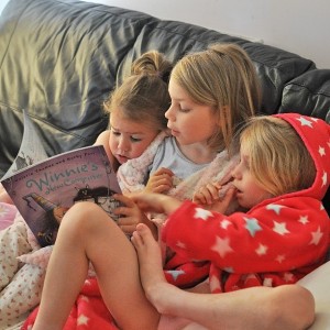 Day 512:  I popped to Tesco at 7am and left one husband and three girls sleeping.  When I returned half an hour later, I found Ella reading a story to her younger sisters (while my husband was still fast asleep upstairs!)