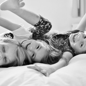 Day 538: The girls invented a new game on this rainy Tuesday afternoon. They all sat on Daddy (banana boat style), who was trying to have a nap before a night shift at work. Then they all fall off onto the bed amidst much screaming and giggling!
